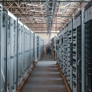 Rows of equipment inside a data center