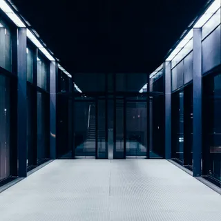 A long secured hallway in a technology facility