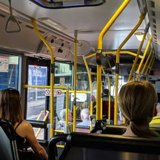 Passengers seated inside a city bus