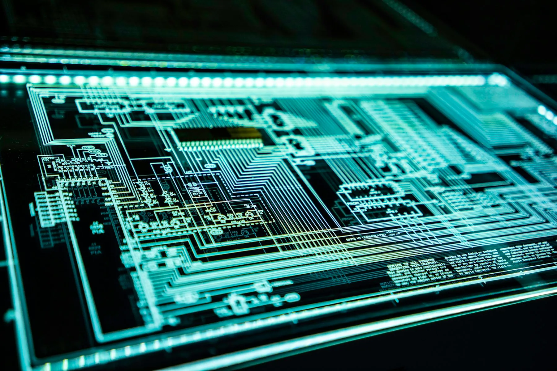 A wall of illuminated digital security displays
